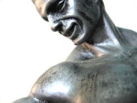 statue of muscular man